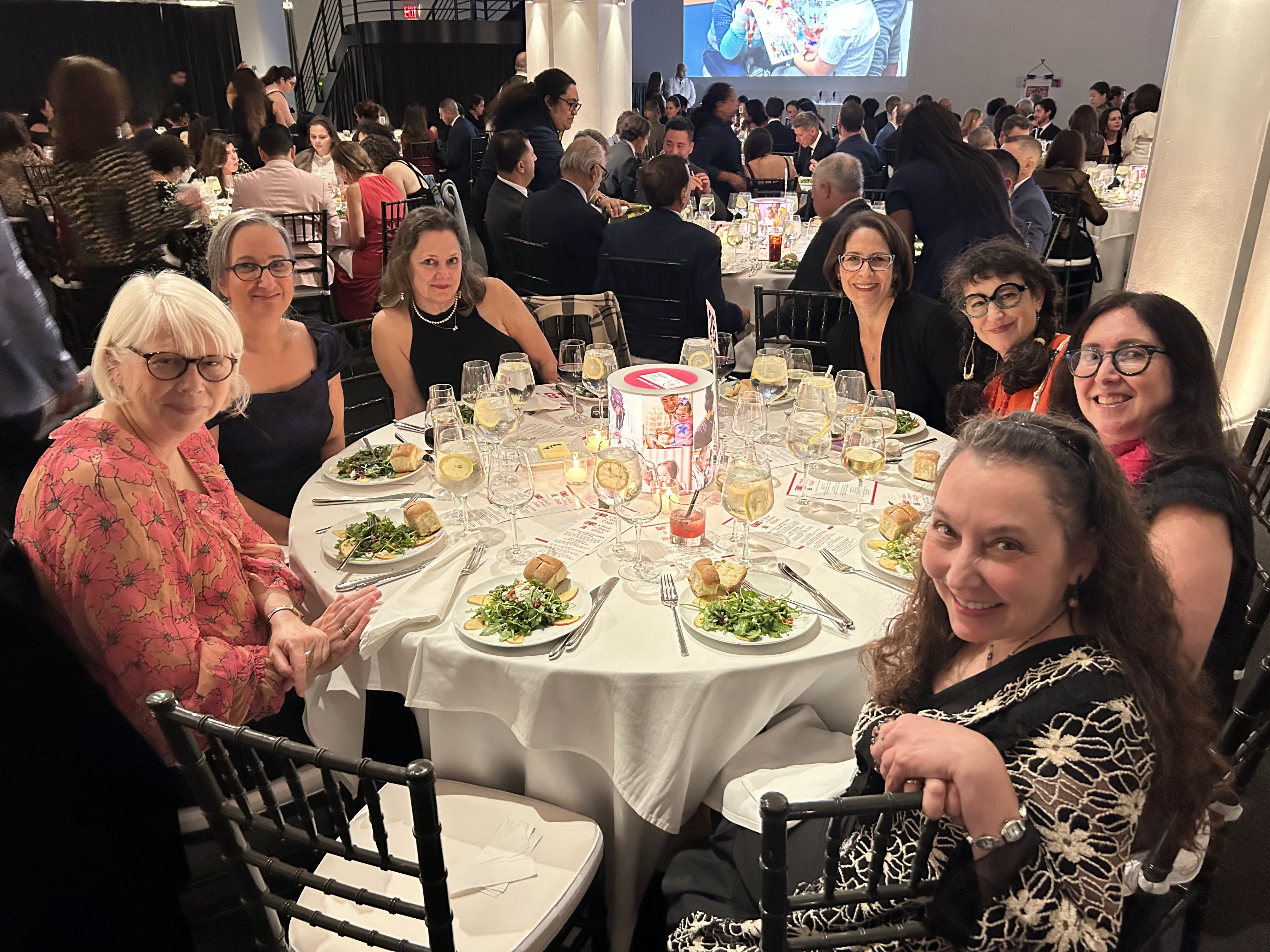 Photo of members of the Barefoot Books team and their guests at the Reach Out and Read Annual Benefit in October.